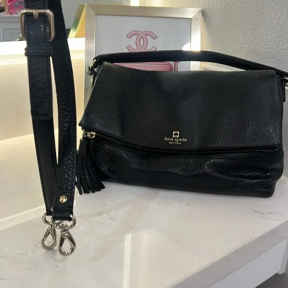 Kate spade everyday purse black leather with removable strap.